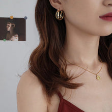 Load image into Gallery viewer, Double-Crossed Gold Hoop Earrings
